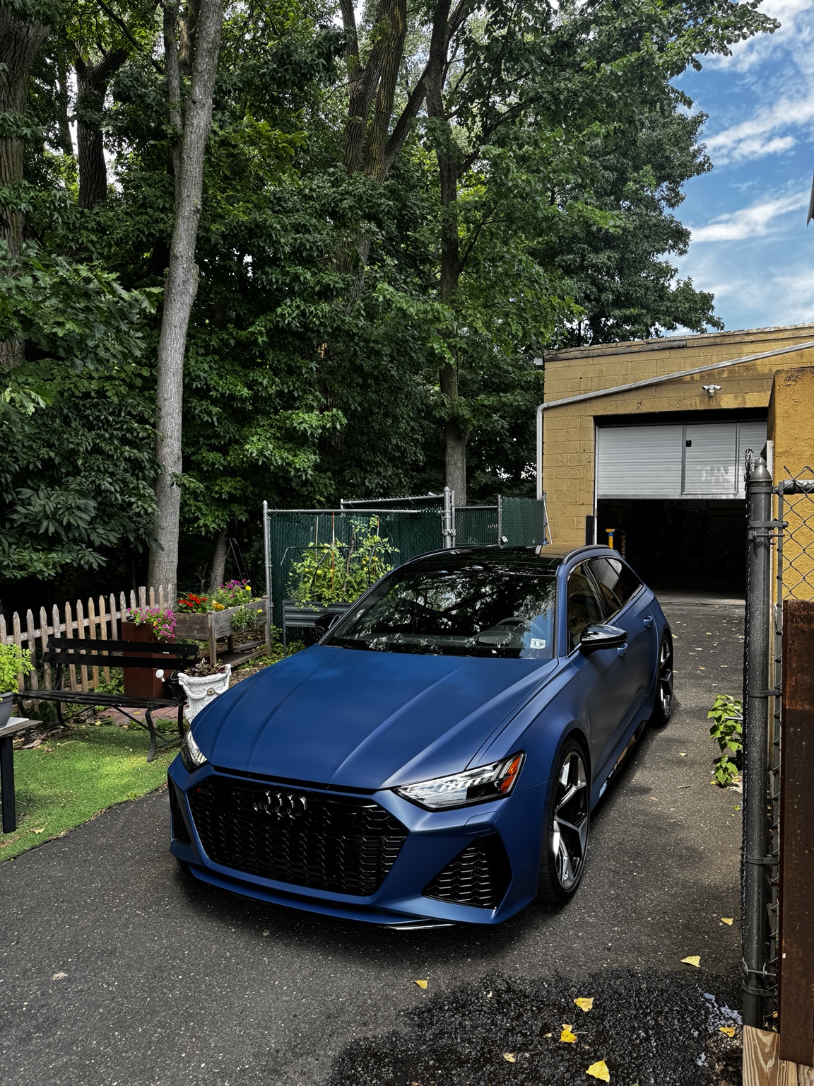 Navarra Blue Audi RS6 Avant outdoors showing its satin paint protection film finish